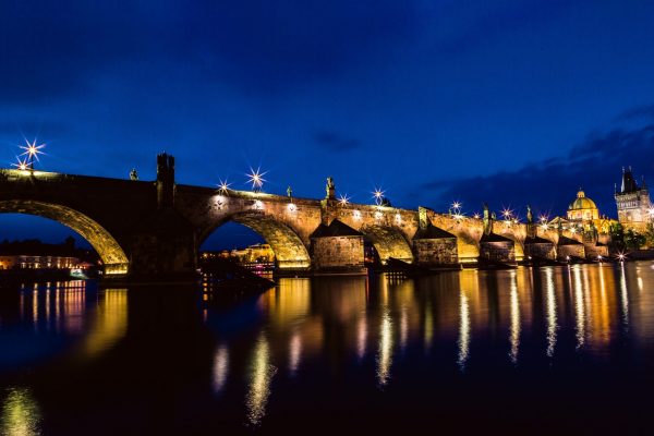 Canva - Brown and Black Concrete Bridge during Night