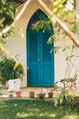 Canva - Closed Blue Wooden Doors