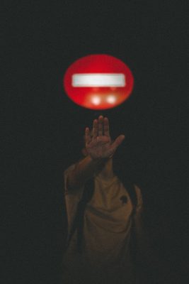 Canva - Man Signal to Stop