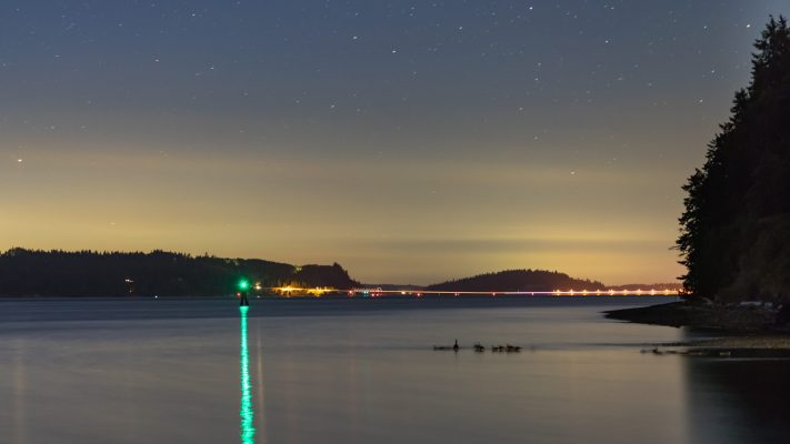 landscape-photo-of-an-ocean-and-a-green-buoy-2539459